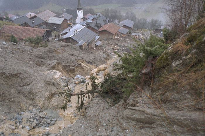 Debris flow reaching a mountain settlement